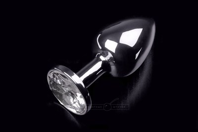 Маленькая серебристая анальная пробка с круглым кончиком и прозрачным кристаллом - 7 см. - фото 84689