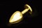 Большая золотая анальная пробка с закругленным кончиком и прозрачным кристаллом - 9 см. - фото 84673